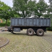 Bild von Hakenliftträger mit Containerschaufel