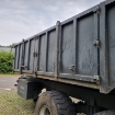 Afbeeldingen van Haakarm carrier met containerbak