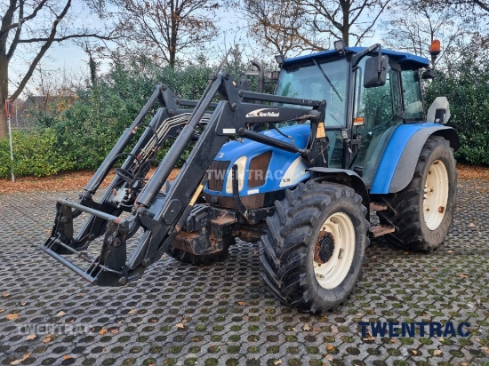 Afbeeldingen van New Holland TL 90 met voorlader